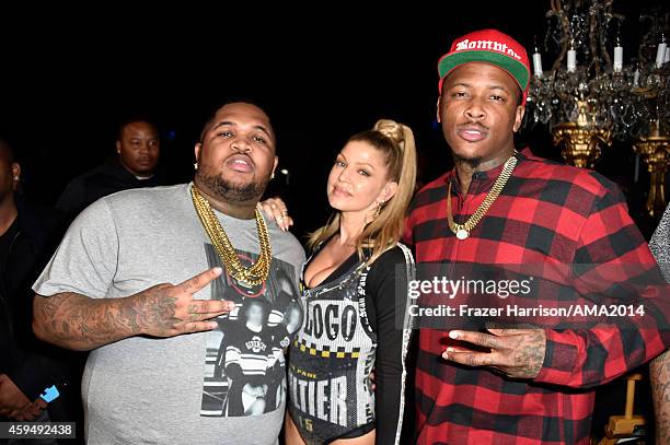 Mustard, recording artist Fergie, and recording artist YG attend the 2014 American Music Awards at Nokia Theatre L.A. Live on November 23, 2014 in...
