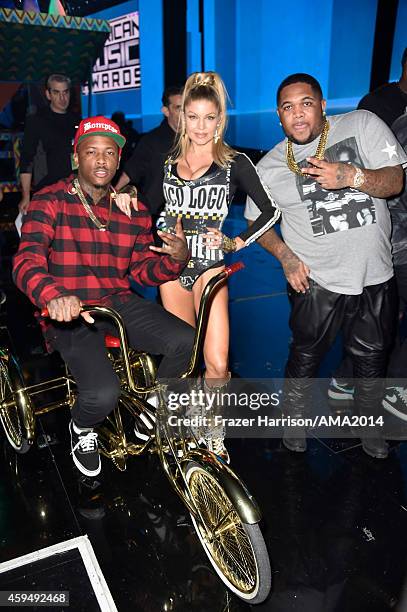 Recording artist YG, recording artist Fergie, and DJ Mustard attend the 2014 American Music Awards at Nokia Theatre L.A. Live on November 23, 2014 in...