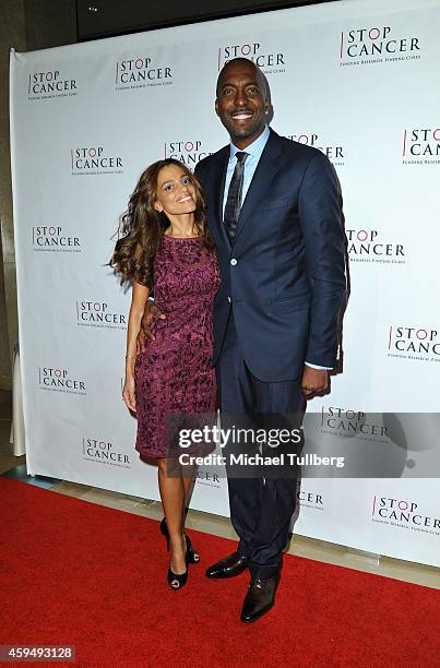 Former NBA player John Salley and wife Natasha Salley attend Stop Cancer's Annual Gala Honoring Lori And Michael Milken at The Beverly Hilton Hotel...