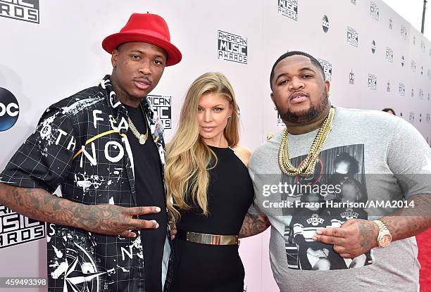 Recording artists YG, Fergie and DJ Mustard attend the 2014 American Music Awards at Nokia Theatre L.A. Live on November 23, 2014 in Los Angeles,...