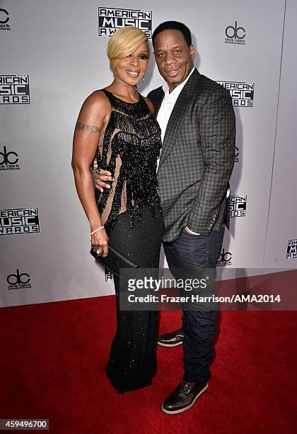 Recording artist Mary J. Blige and producer Kendu Isaacs attend the 2014 American Music Awards at Nokia Theatre L.A. Live on November 23, 2014 in Los...