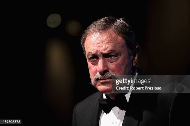 John Newcombe arrives at the 2014 Newcombe Medal Awards at Crown Palladium on November 24, 2014 in Melbourne, Australia.