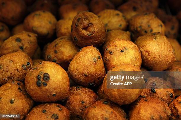 Oliebollen from Dutch Doughnutmaker Richard Visser, the winner of the Dutch contest of the best 'oliebol' , are displayed in Rotterdam, The...