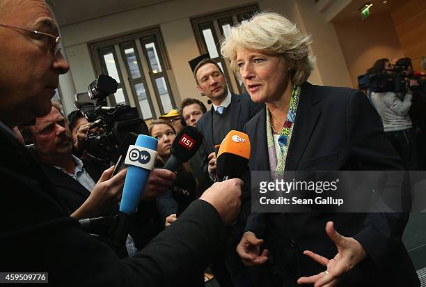 German State Culture Minister Monika Gruetters speaks to the media after signing an agreement moments before with Swiss and Bavarian representatives...
