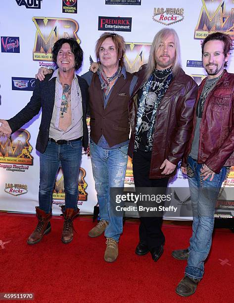 Guitarist Tracii Guns, drummer Rikki Rocket, bassist Eric Brittingham and singer/guitarist Brandon Gibbs of Devil City Angels arrive at The 5th...