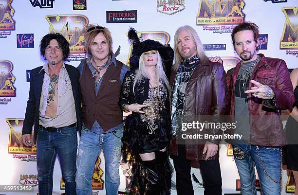 Guitarist Tracii Guns, drummer Rikki Rocket of Devil City Angels and publisher Sally Steele and bassist Eric Brittingham and singer/guitarist Brandon...