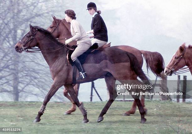 Queen Elizabeth II riding with her daughter Princess Anne in Windsor Park on 22nd April 1968. This image is one of a series taken by Ray Bellisario...