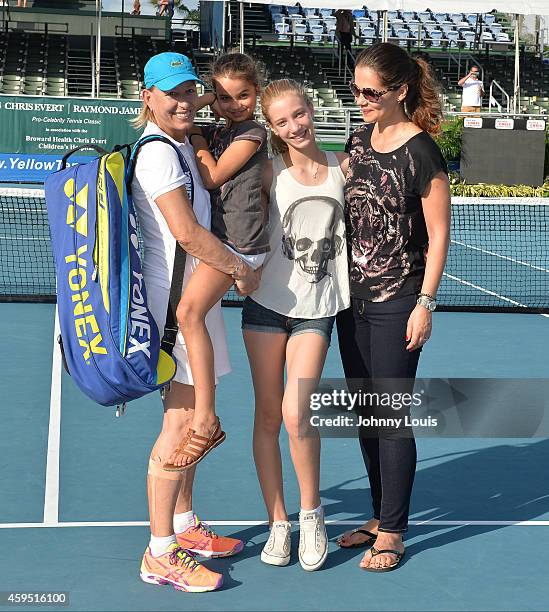 Martina Navratilova, Emma Lemigova, Victoria Lemigova and Julia Lemigova participate in the 25th Annual Chris Evert/Raymond James Pro-Celebrity...