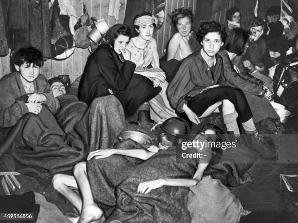 Picture taken in April 1945 in Nazi Bergen Belsen death camp, after its liberation by the British troops, shows female deportees suffering from...