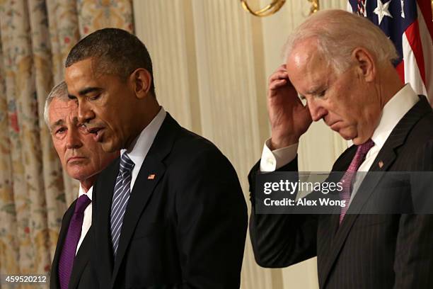 President Barack Obama speaks as Secretary of Defense Chuck Hagel and Vice President Joe Biden look on during a press conference announcing Hagel's...