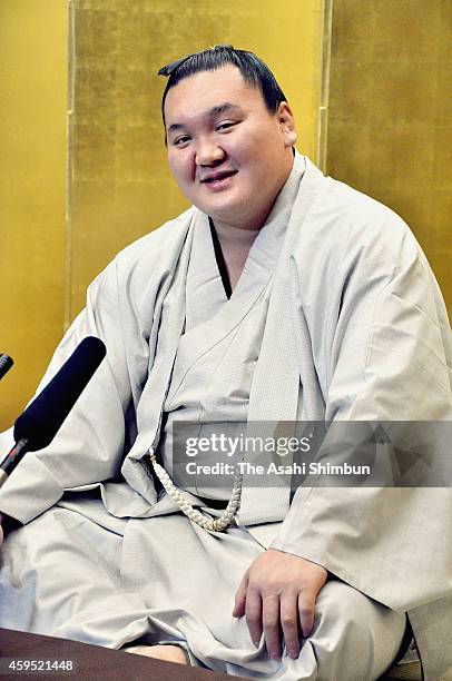 Mongolian yokozuna Hakuho speaks during a press conference a day after winning the Grand Sumo Kyushu Tounament on November 24, 2014 in Fukuoka, Japan.