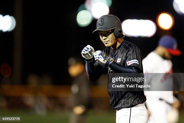 Kenta Imamiya of Samurai Japan reacts to hitting an RBI single against the MLB All-Stars during the game at Okinawa Cellular Stadium during the Japan...