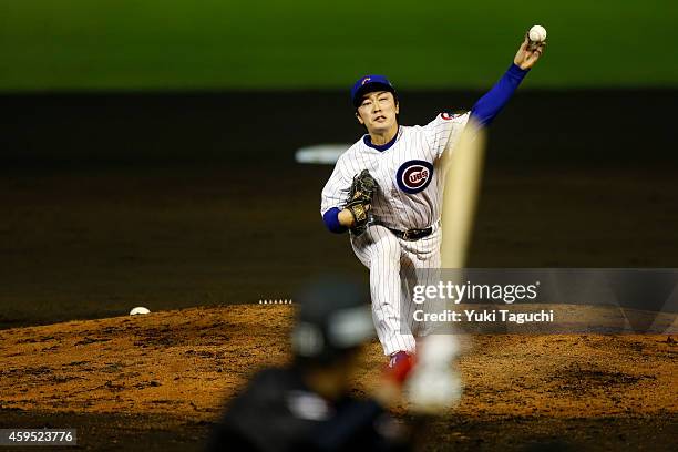 Tsuyoshi Wada of the Chicago Cubs pitches against Samurai Japan during the game at Okinawa Cellular Stadium during the Japan All-Star Series on...