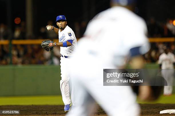 Alcides Escobar of the Kansas City Royals throws to first base during the game against Samurai Japan at Okinawa Cellular Stadium during the Japan...