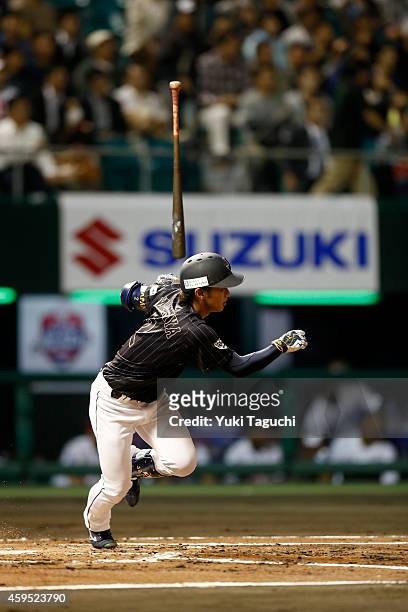 Kenta Imamiya of Samurai Japan hits an RBI single against the MLB All-Stars during the game at Okinawa Cellular Stadium during the Japan All-Star...