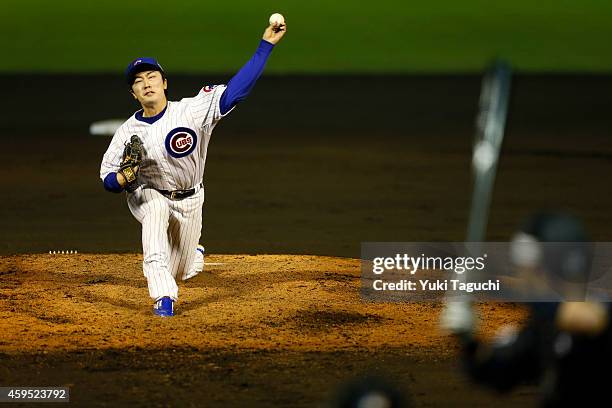 Tsuyoshi Wada of the Chicago Cubs pitches against Samurai Japan during the game at Okinawa Cellular Stadium during the Japan All-Star Series on...