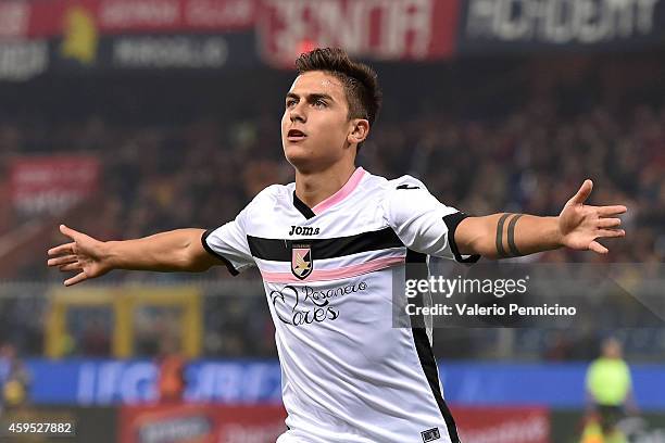 Paulo Dybala of US Citta di Palermo celebrates after scoring the opening goal during the Serie A match between Genoa CFC and US Citta di Palermo at...