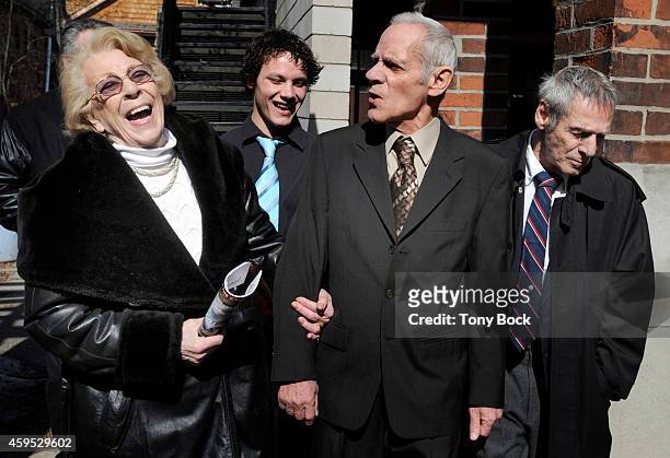 Romeo Phillion laughs with his sister Simonne Snowdon and brother Armand Phillion leaving a press conference after being exonerated from a long...
