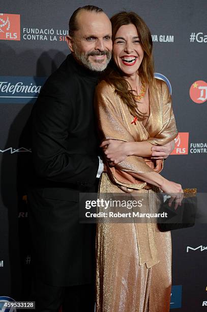 Miguel Bose and Raquel Sanchez Silva pose during a photocall for 'Gala Against HIV 2014' at the Museu Nacional d'Art de Catalunya on November 24,...