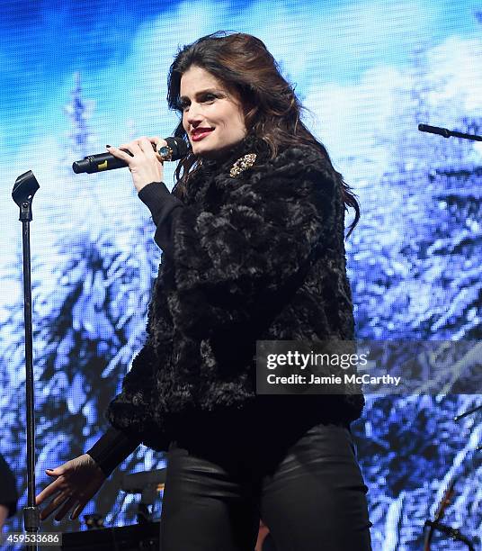 Idina Menzel performs at the 2014 Bloomingdale's Holiday Window Unveiling at Bloomingdale's 59th Street Store on November 24, 2014 in New York City.