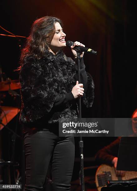 Idina Menzel performs at the 2014 Bloomingdale's Holiday Window Unveiling at Bloomingdale's 59th Street Store on November 24, 2014 in New York City.