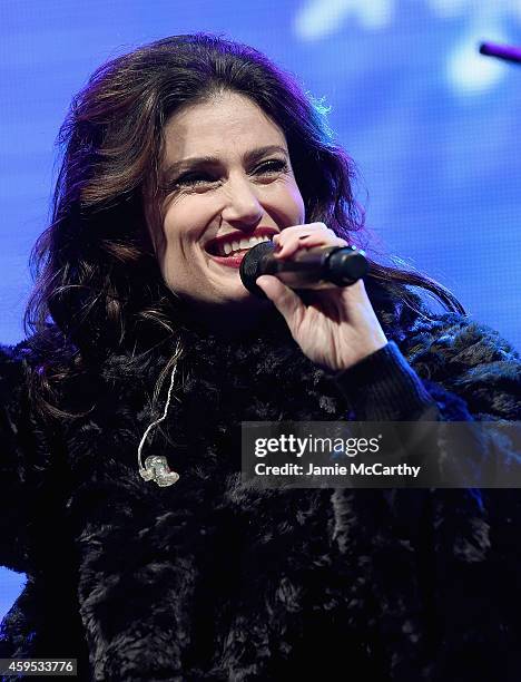 Idina Menzel performs at the 2014 Bloomingdale's Holiday Window Unveiling at Bloomingdale's 59th Street Store on November 24, 2014 in New York City.