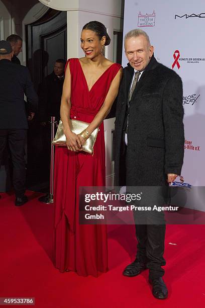 Annabelle Mandeng and Jean-Paul Gaultier attends the Artists Against Aids Gala 2014 at Theater des Westens on November 24, 2014 in Berlin, Germany.