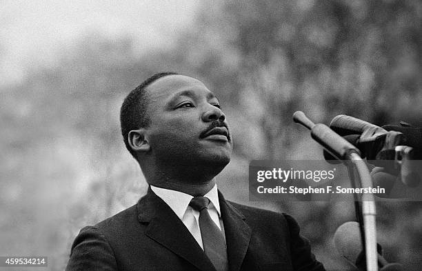 Dr Martin Luther King Jr speaking before crowd of 25,000 Selma To Montgomery, Alabama civil rights marchers, in front of Montgomery, Alabama state...