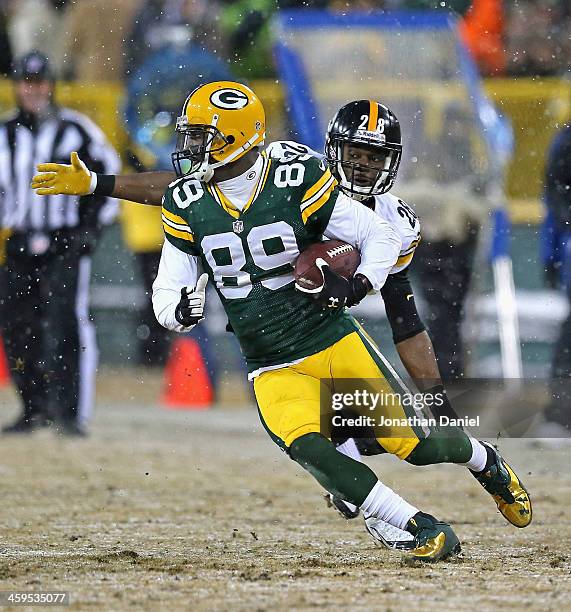 James Jones moves past Cortez Allen of the Green Bay Packers of the Pittsburgh Steelers at Lambeau Field on December 22, 2013 in Green Bay,...