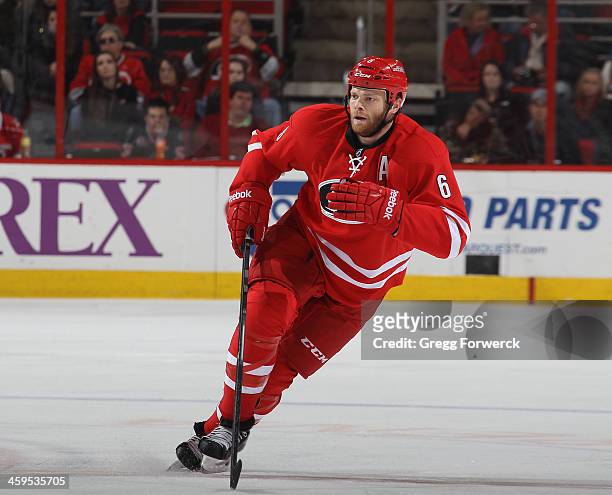 Tim Gleason of the Carolina Hurricanes skates to a defensive position against the Columbus Blue Jackets during their NHL game at PNC Arena on...
