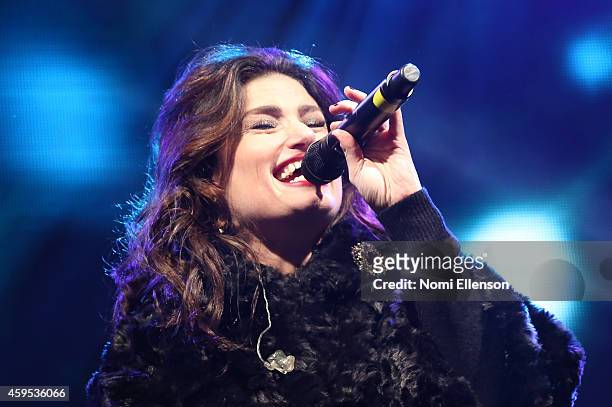 Idina Menzel performs at Bloomingdale's Holiday Window Unveiling at Bloomingdale's 59th Street Store on November 24, 2014 in New York City.