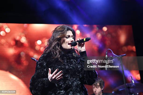 Idina Menzel performs at Bloomingdale's Holiday Window Unveiling at Bloomingdale's 59th Street Store on November 24, 2014 in New York City.