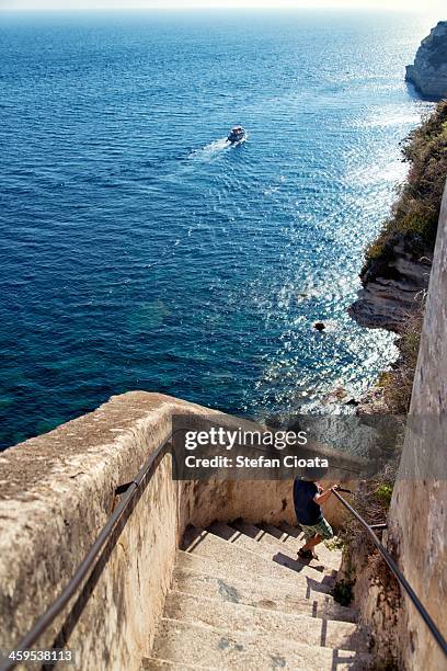 descending the stairs of aragon - bonifacio stock pictures, royalty-free photos & images