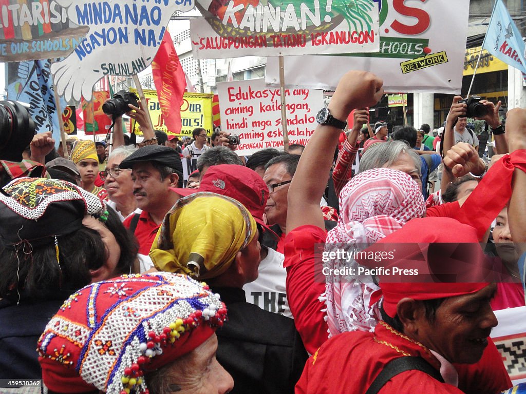 Activists converge in an intersection in Recto Avenue as the...