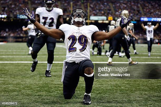 Justin Forsett of the Baltimore Ravens celebrates a touchdown during the second quarter of a game against the New Orleans Saints at the Mercedes-Benz...
