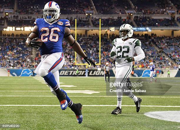 Anthony Dixon of the Buffalo Bills scores a fourth quarter touch down against the New York Jets at Ford Field on November 24, 2014 in Detroit,...