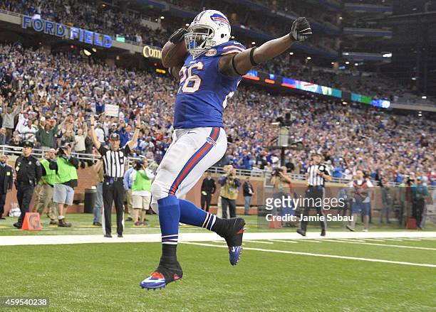 Anthony Dixon of the Buffalo Bills celebrates a 30-yard fourth quarter touchdown against the New York Jets at Ford Field on November 24, 2014 in...