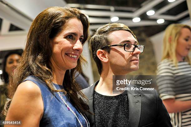 Christian Siriano speaks during the Rent the Runway DC store Opening at Rent The Runway on November 24, 2014 in Washington, DC.