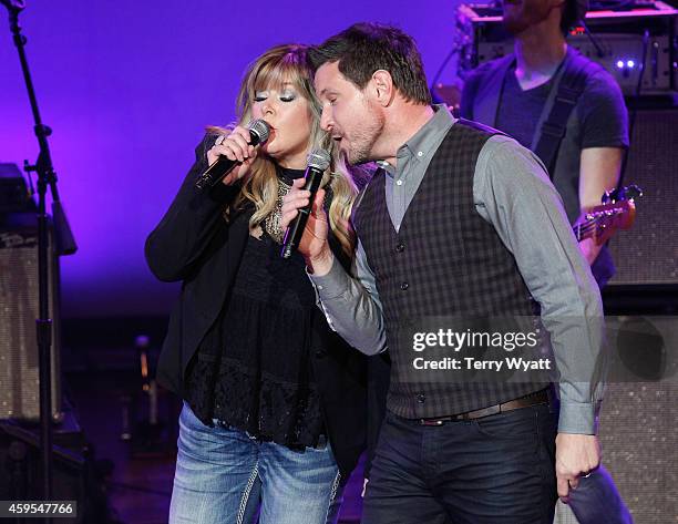 Jamie O'Neal and Ty Herndon perform during Charlie Daniels & Friends Christmas 4 Kids 2014 at the Ryman Auditorium on November 24, 2014 in Nashville,...