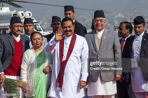 Mahinda Rajapaksa, President of Sri Lanka is greeted by the Deputy Prime Minister of Nepal Bam Dev Gautam during his arrival in Tribhuvan...