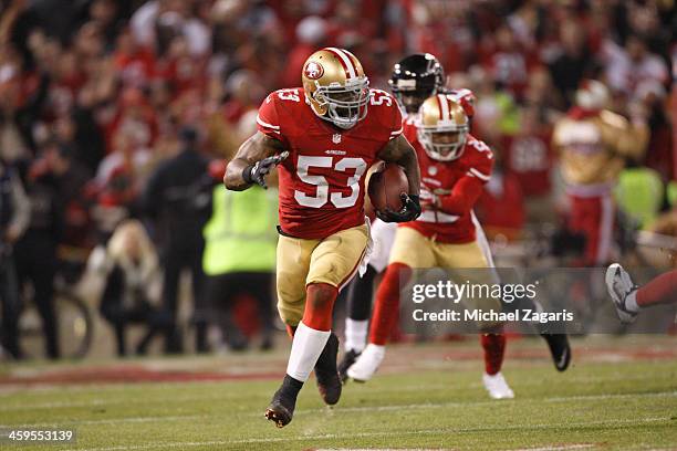 NaVorro Bowman of the San Francisco 49ers returns an interception 89-yards for a touchdown during the game against the Atlanta Falcons at Candlestick...