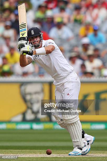 Kevin Pietersen of England hits the ball during day three of the Fourth Ashes Test Match between Australia and England at Melbourne Cricket Ground on...