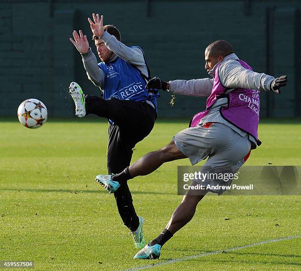 Glen Johnson and Alberto Moreno of Liverpool during a training session prior the match between PFC Ludogorets Razgrad and Liverpool at Melwood...