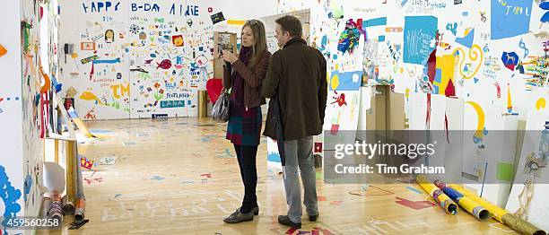 Visitors at Atelier Public 2, exhibition of free expression artworks by members of the public, on display in Gallery of Modern Art, GoMA, Royal...