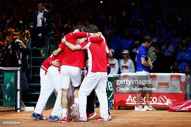 Roger Federer of Switzerland, Stanislas Wawrinka of Switzerland , Marco Chiudinelli of Switzerland, Michael Lammer of Switzerland and Captain Severin...