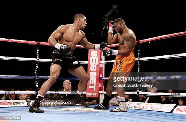 Anthony Joshua in action with Michael Sprott during their Eliminator for the British Heavyweight Championship at Liverpool Echo Arena on November 22,...