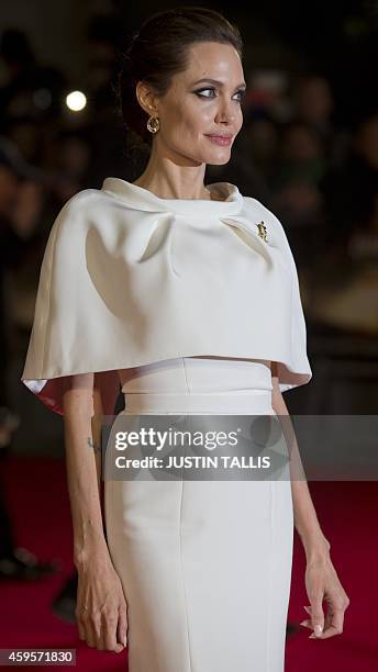 Director and actress Angelina Jolie arrives on the red carpet for the UK premiere of the film "Unbroken" at Leicester Square in London on November...