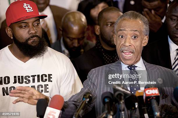 Rev. Al Sharpton speaks during a press conference at Greater St. Marks Church as Michael Brown Sr. Looks on November 25, 2014 in Dellwood, Missouri....