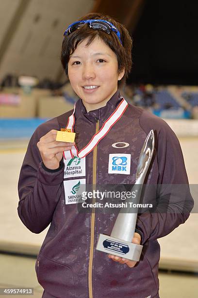Nao Kodaira of Japan poses with the gold medal after winning the women's 500m victory ceremony during the Japan Speed Skating Olympic Qualifying...