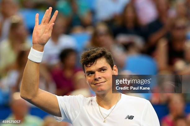 Milos Raonic of Canada waves to the crowd after winning the men's singles match against Bernard Tomic of Australia during day one of the 2014 Hopman...